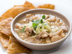 White bean chicken chili in a serving bowl with chips