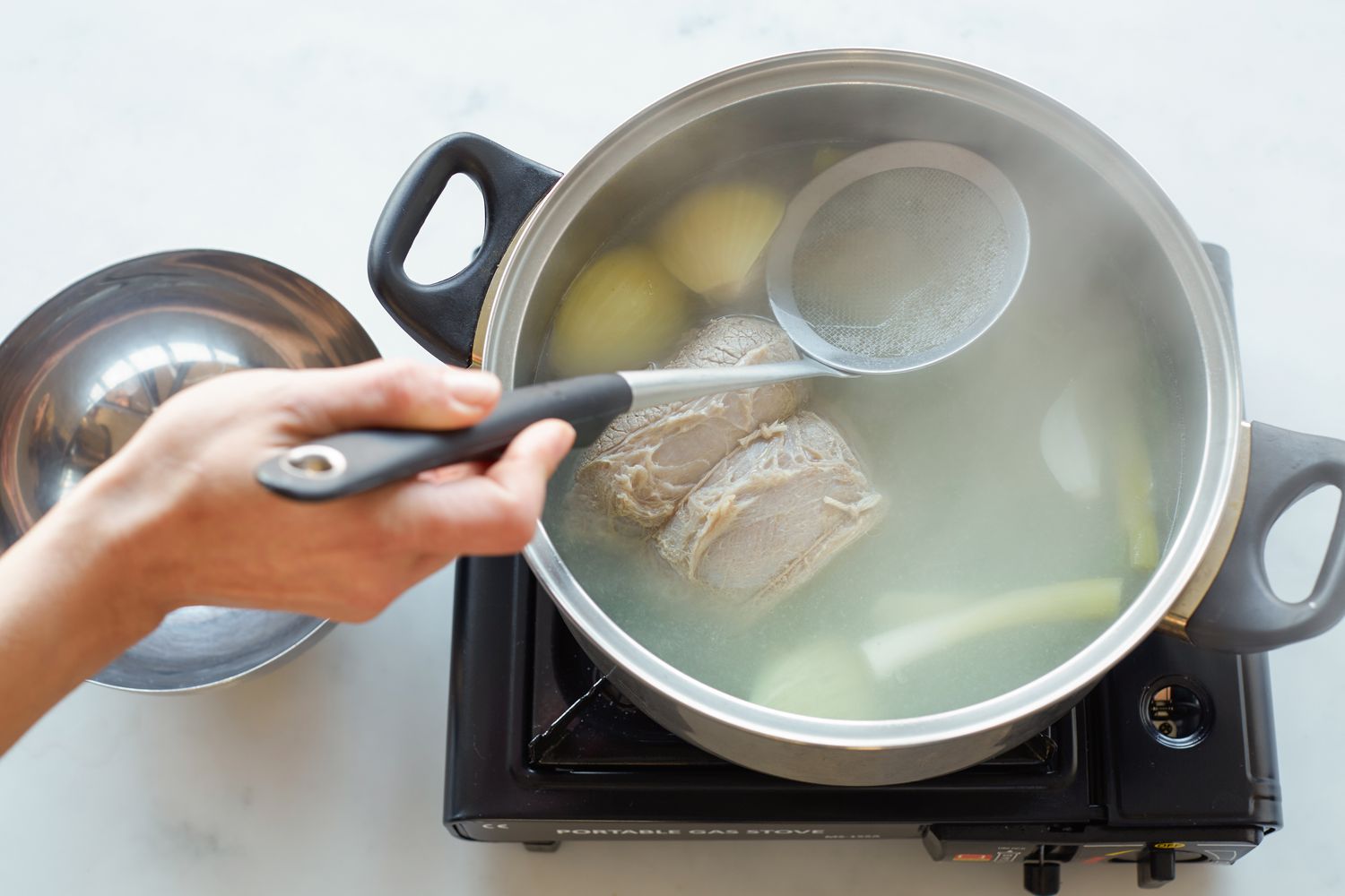 Making rice cake soup.