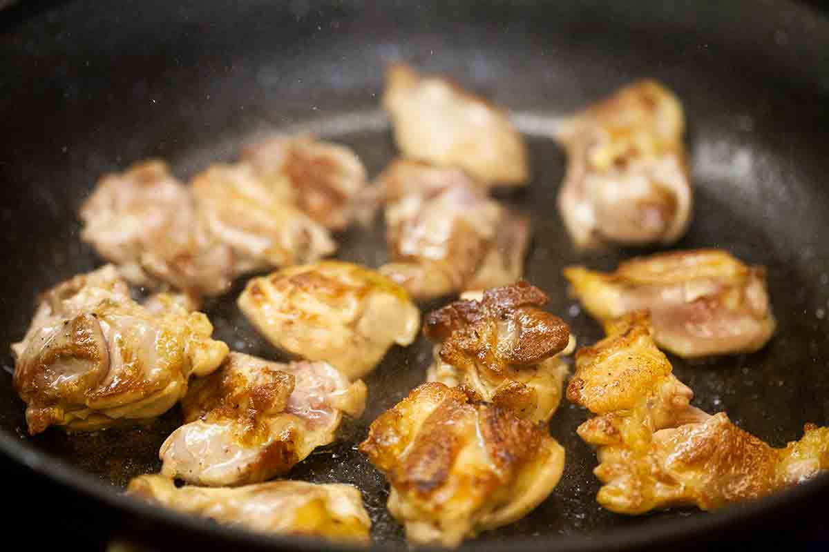 Browning Chicken Pieces for Cream of Mushroom Chicken and Rice Casserole