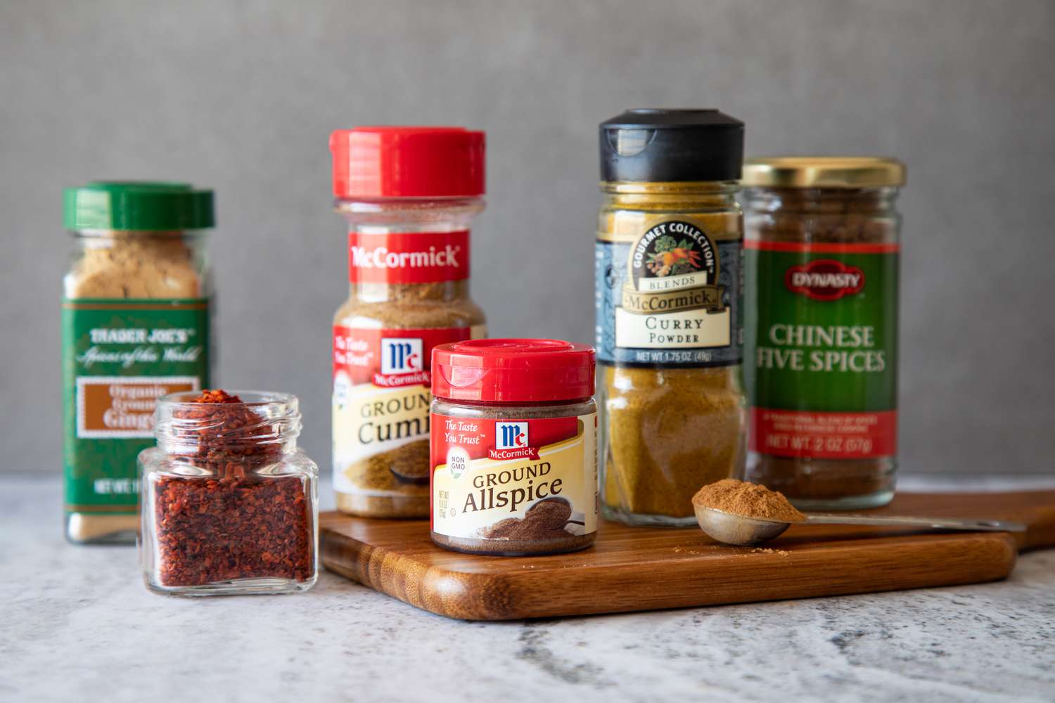 Bottles of spices on a cutting board How to Store Spices