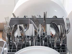 Utensils in a dishwasher