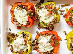 Cajun stuffed bell peppers in a baking dish