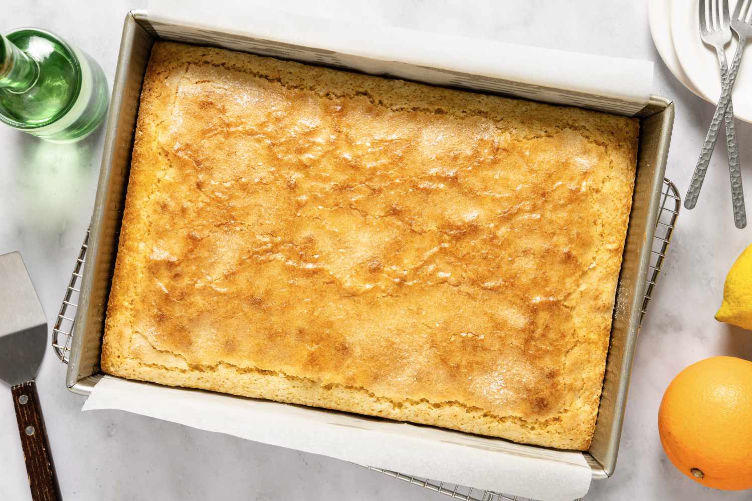 A freshly baked Coca de Llanda in a rectangular baking pan