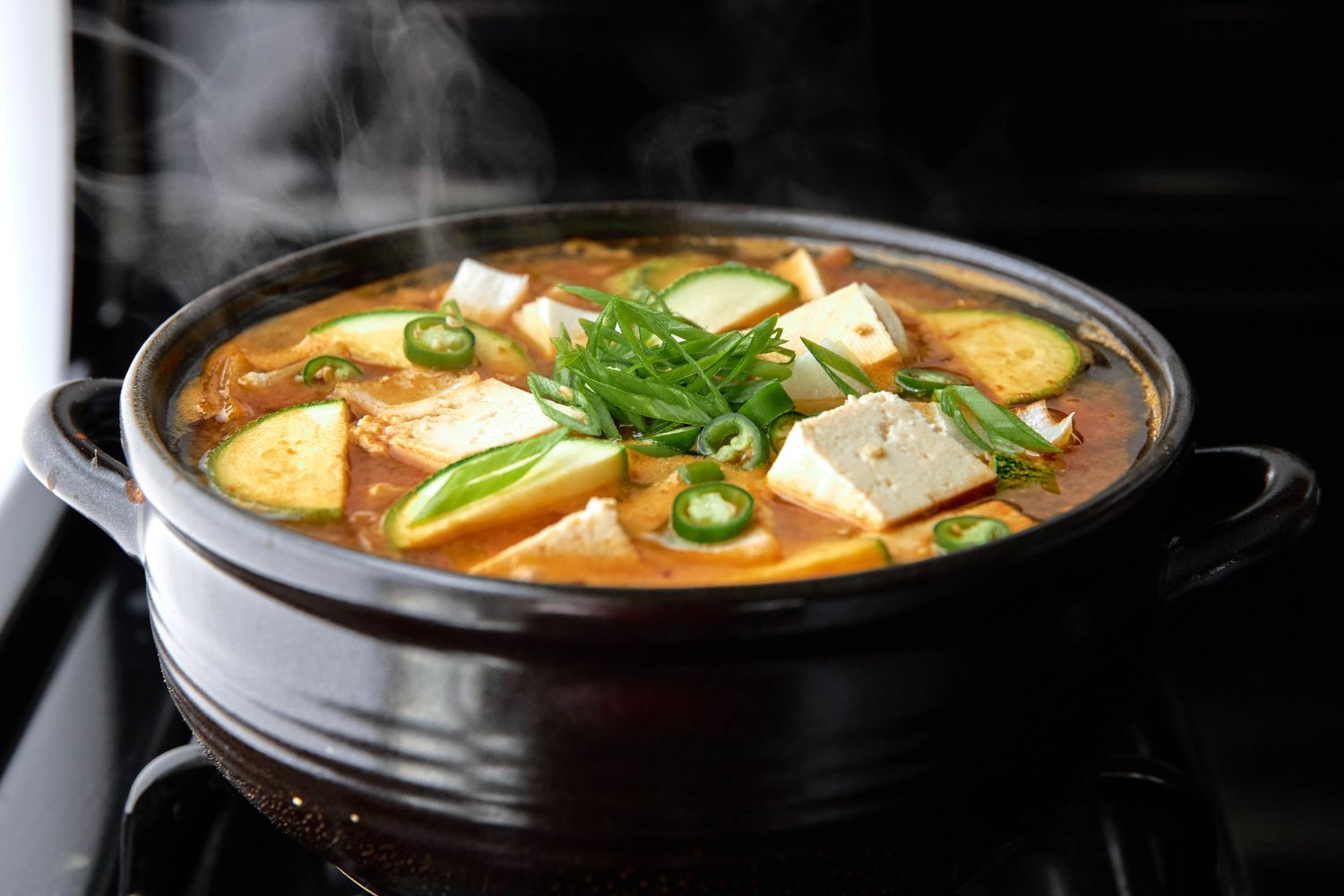 Cheonyang Peppers and Sliced Scallions Added to Soybean Paste Stew 
