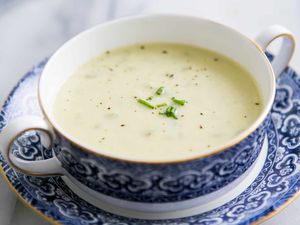 Creamy Celery Soup in a decretive blue bowl