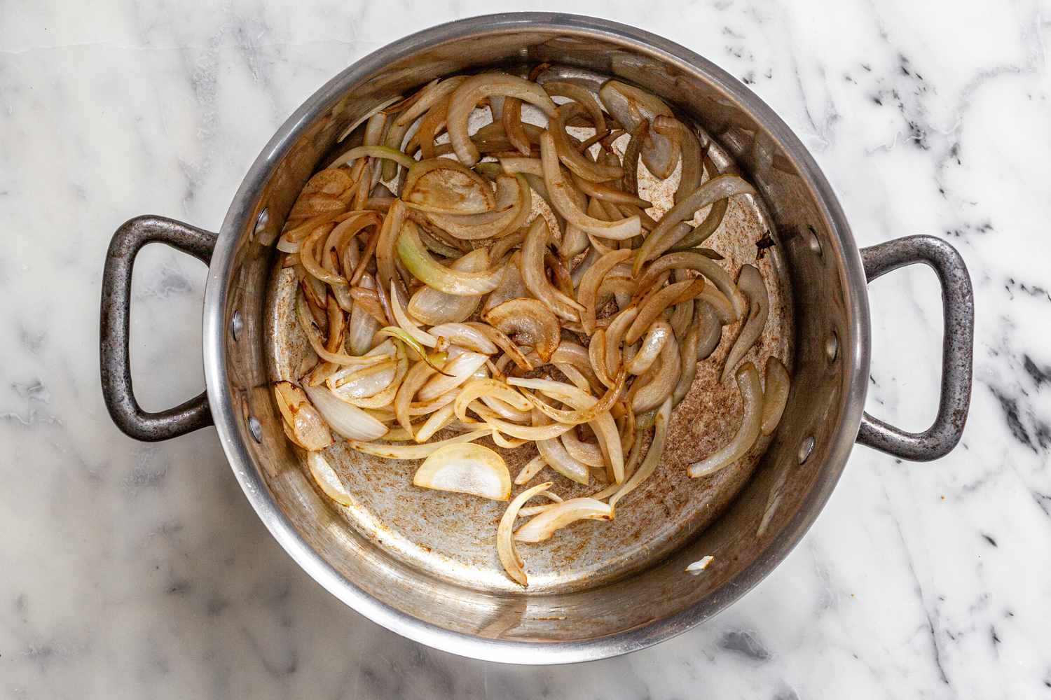 Pot of Cooked Onions for Creamy Chicken Enchilada Soup Recipe
