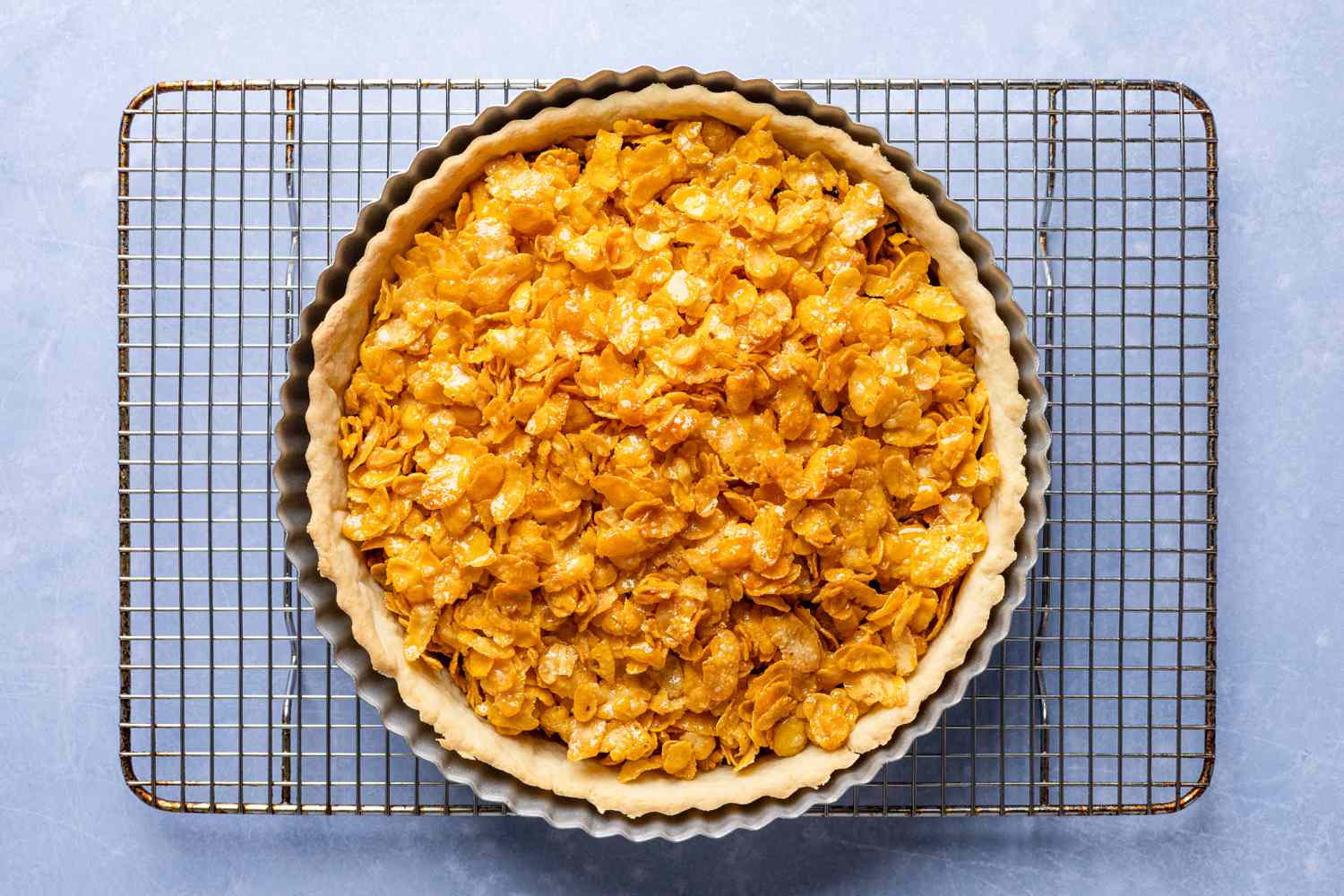 cornflake tart cooling on the wire rack after final bake for cornflake tart recipe