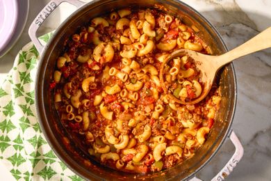 overhead view of a pot of American Chop Suey with a ladle