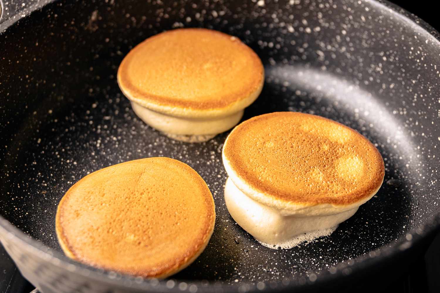 Japanese Souffle Pancakes Flipped in Skillet 