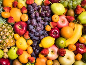 all kinds of different fruits in a cluster