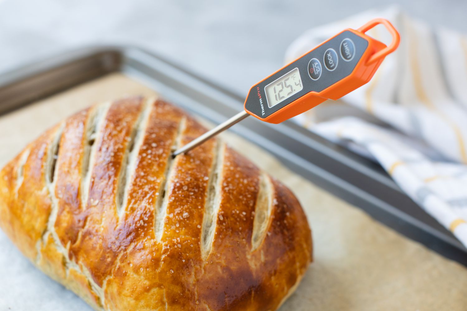 Internal Temperature of Baked Beef Wellington Measured Using Digital Thermometer 