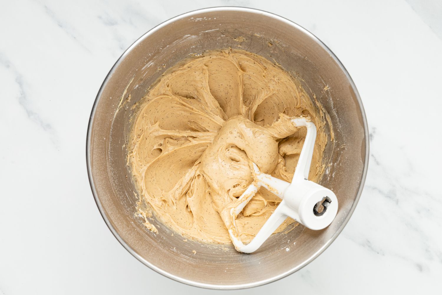 Coffee Coconut Banana Bread Cake's Icing Whipped Together in a Mixer Bowl With Paddle Attachment