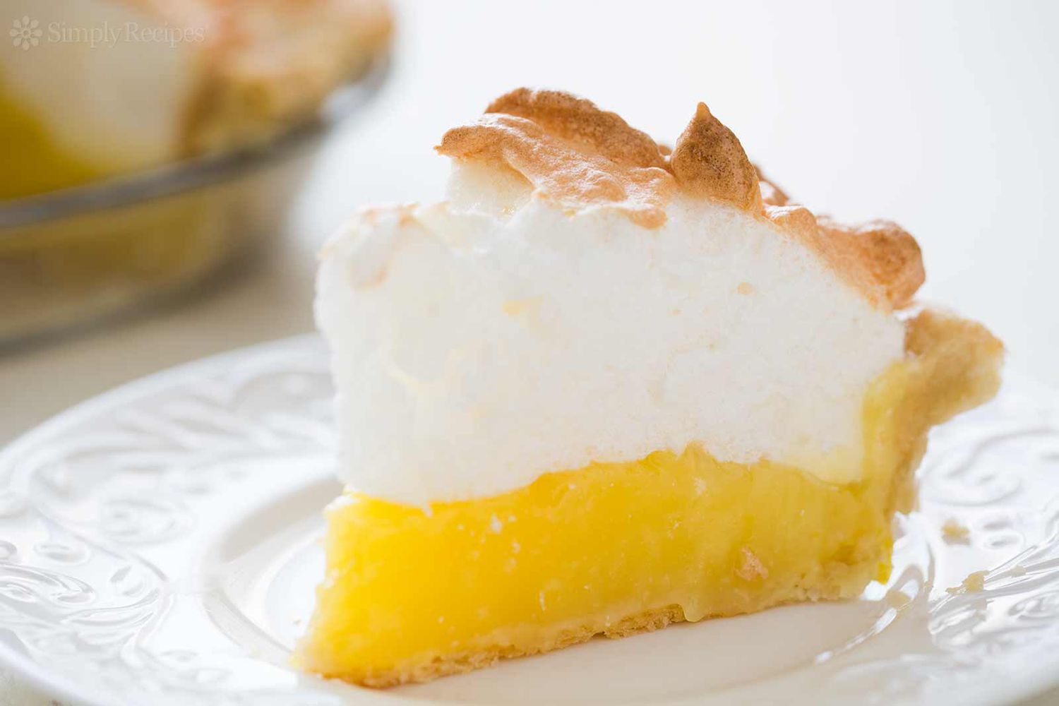 Slice of the Best Lemon Meringue Pie on Plate