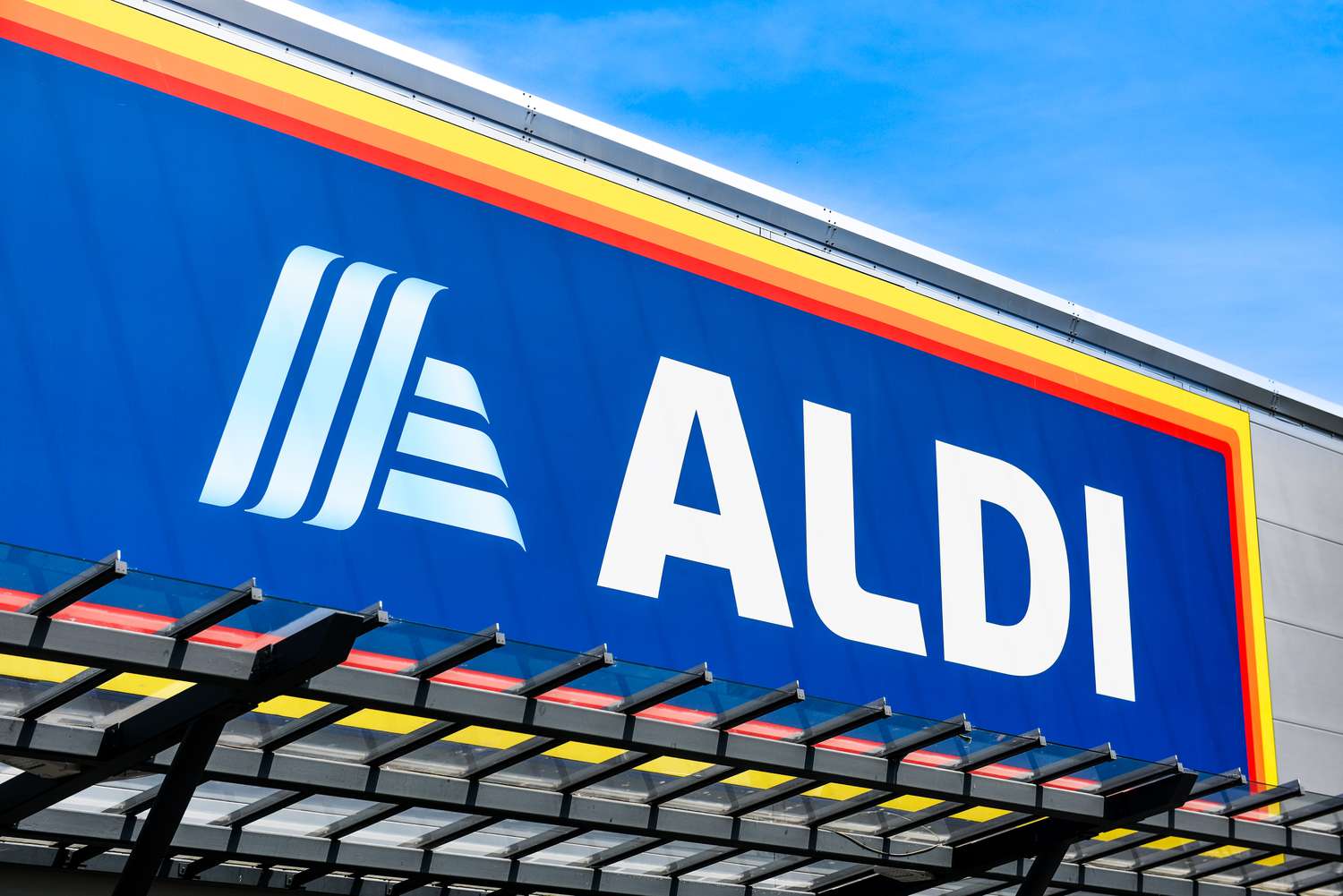 Outdoor photo of a Aldi store sign and logo