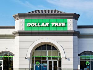 Exterior of a Dollar Tree store with visible signage and building entrance