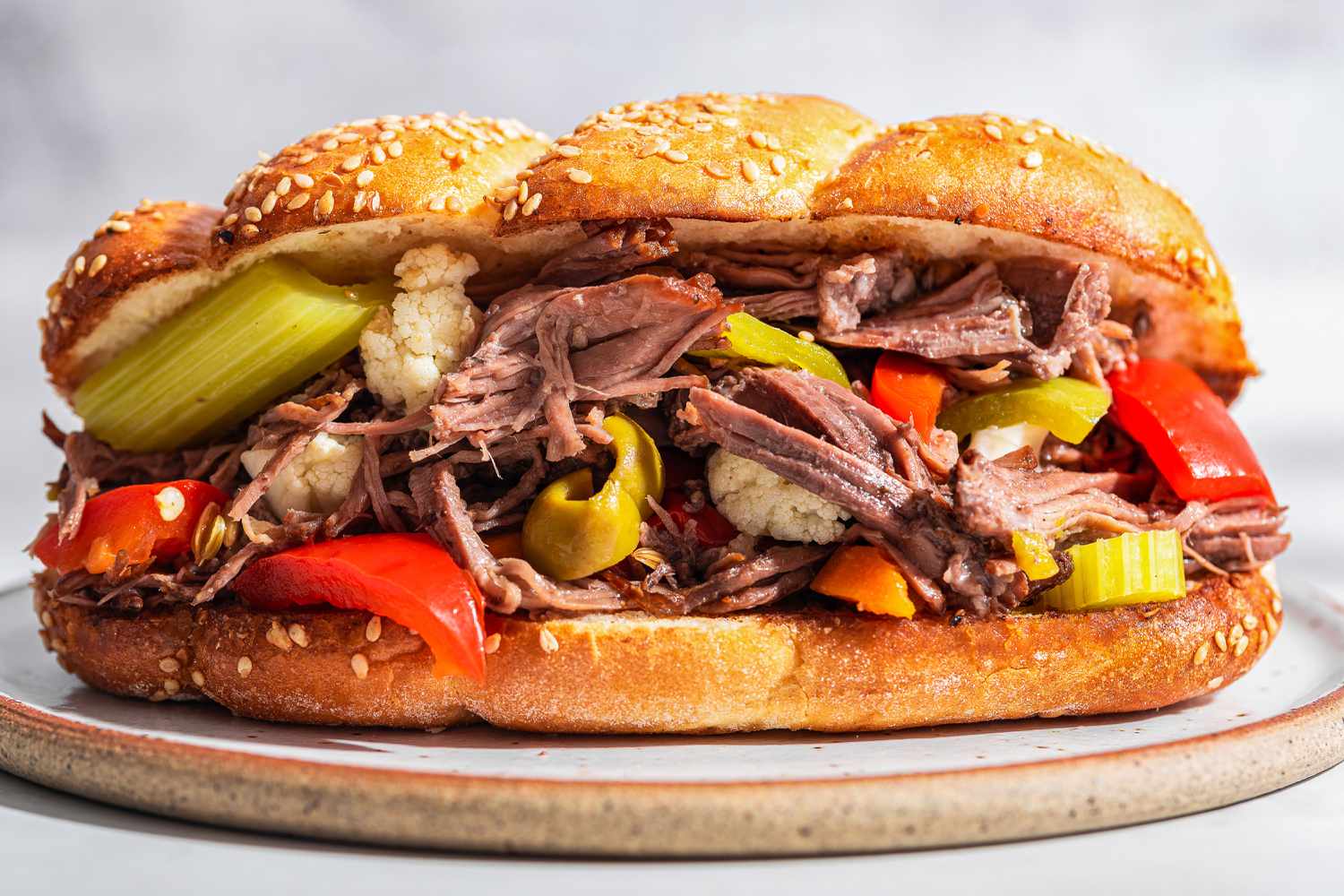 Italian Style Beef sandwich on a sesame seed roll