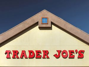 Trader Joes storefront gablestyle facade with brand name prominently displayed