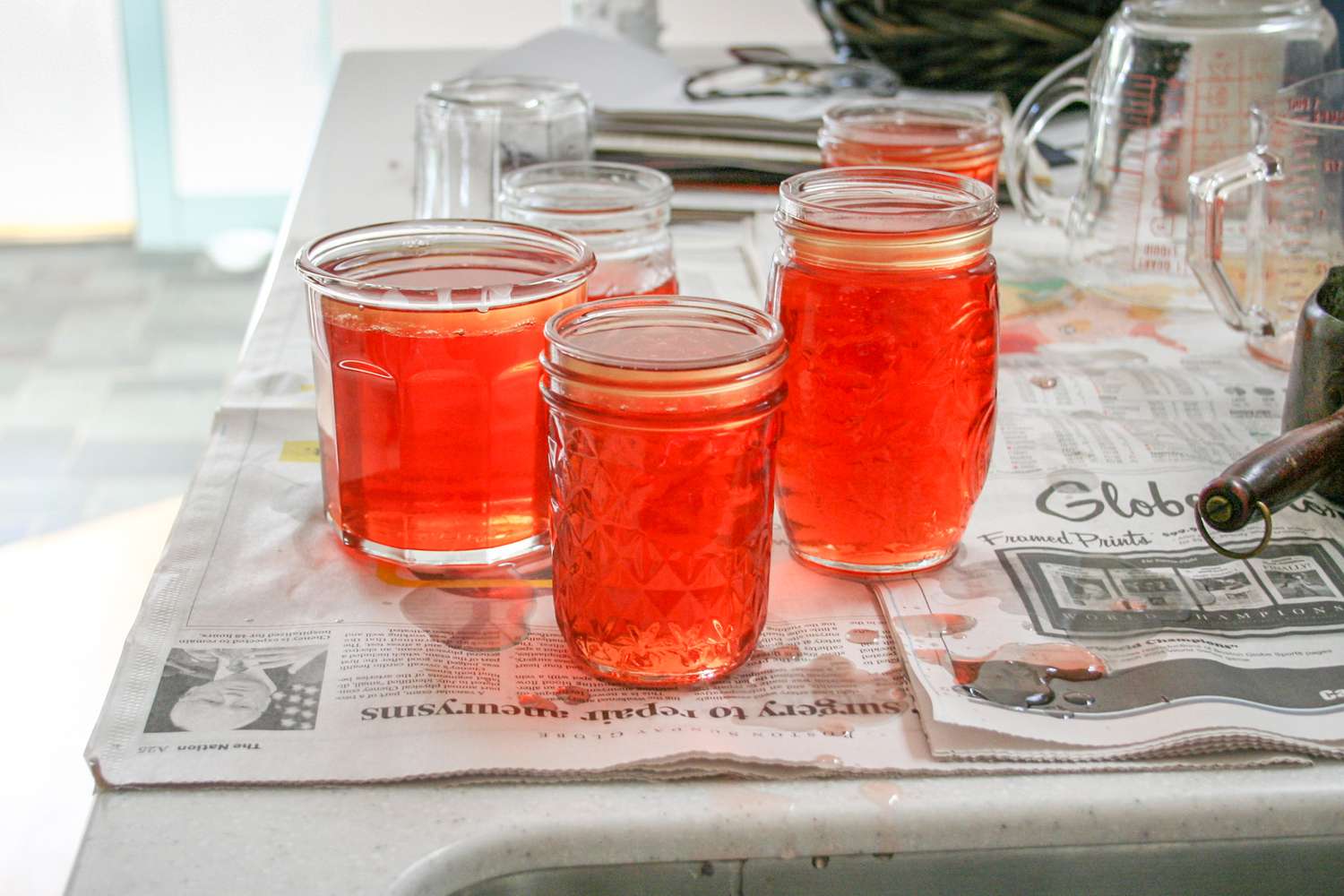 Five jars of homemade quince jelly 