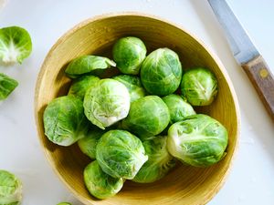 Brussels sprouts in a wooden bowl