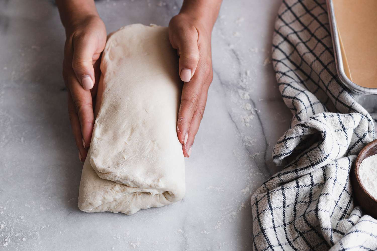 Sourdough Sandwich Loaf Dough Folded Again Widthwise on a Floured Surface