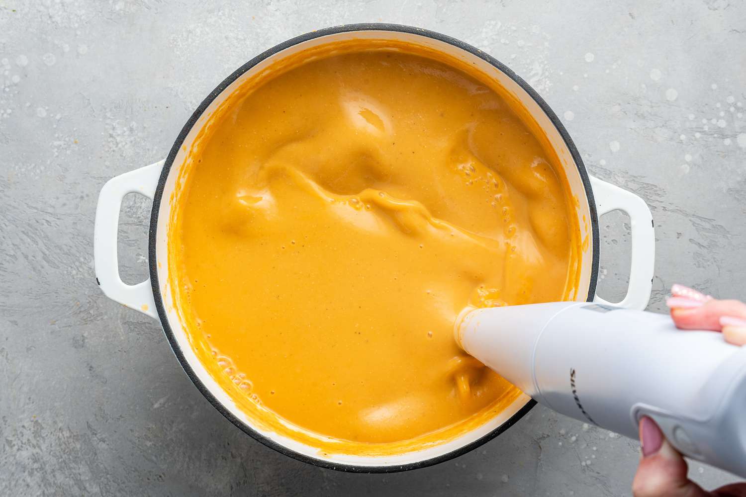 Mercimek Corbasi Blended in Dutch Oven Using an Immersion Blender 