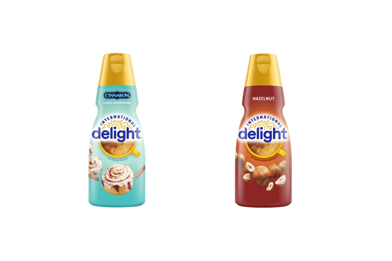 A bottle of International Delight Cinnabon coffee creamer and a bottle of International Delight hazelnut coffee creamer.