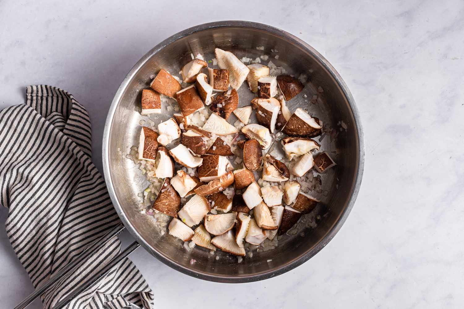 A pot of chopped mushrooms 