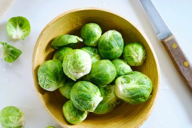 Brussels sprouts in a wooden bowl