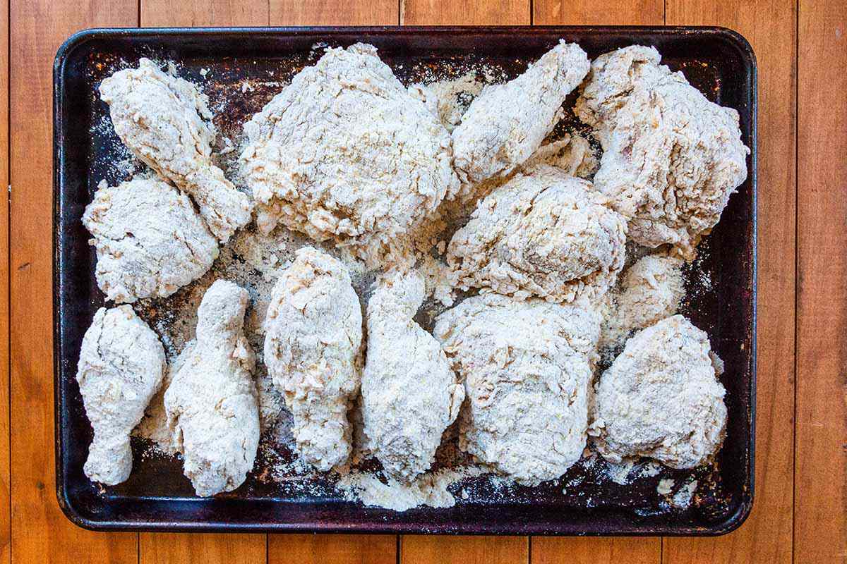 Sweet tea brined fried chicken breaded chicken ready for frying