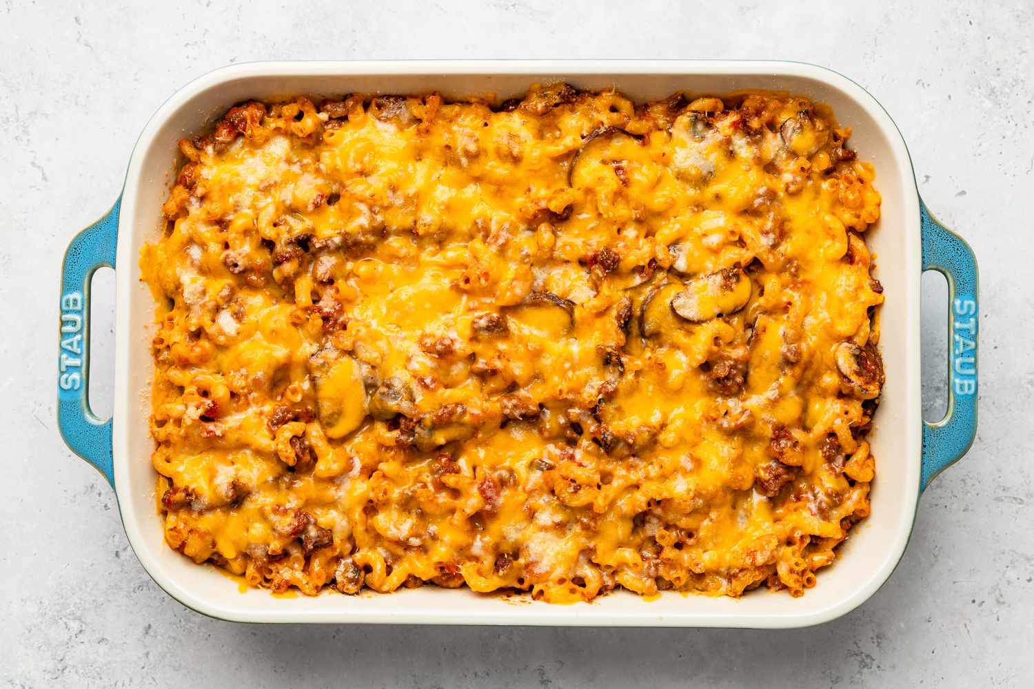 Baked Johnny Marzetti casserole in the casserole dish