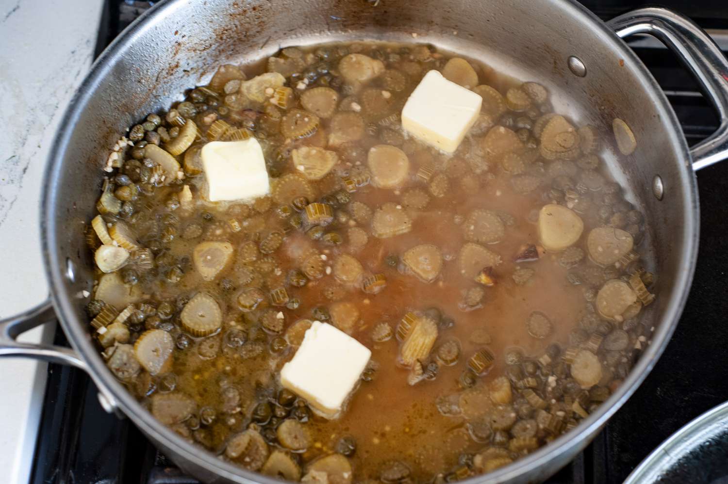 Add butter to the sauce.