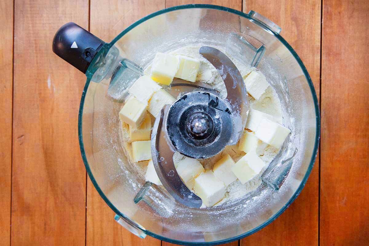 Cubed butter in a food processor to make easy shoofly pie.