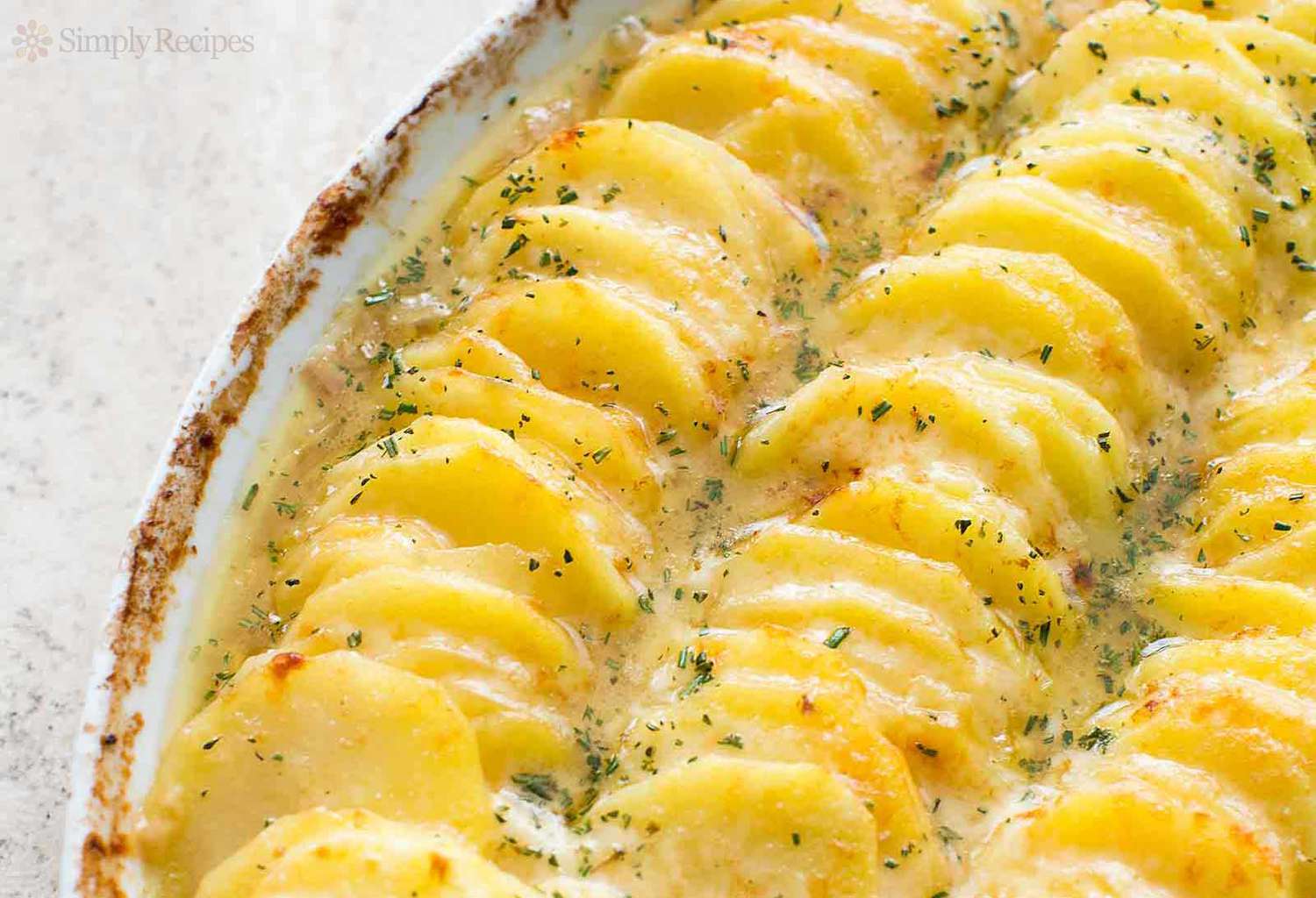 Close up of a casserole dish of scalloped potatoes