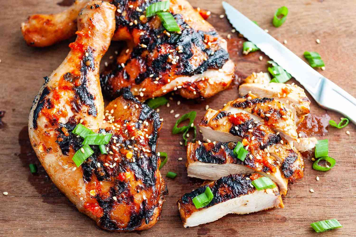 Chili Garlic Chicken Recipe sliced on a cutting board
