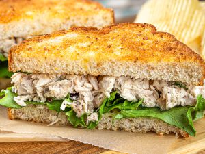 A photo of a tuna salad sandwich with lettuce