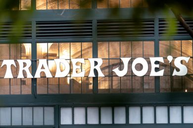 Trader Joe's sign on a storefront window and entryway