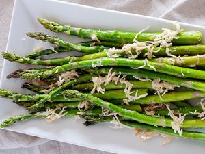 Oven baked asparagus on a platter.